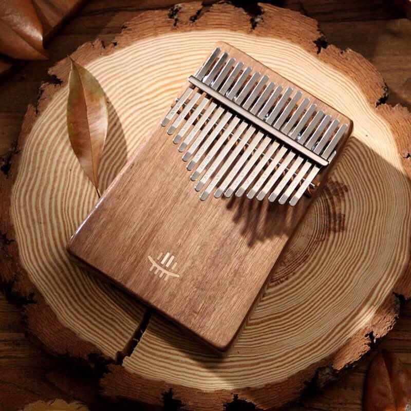 MiSoundofNature 17 Key Hollow Kalimba Thumb Piano, Box Resonace Walnut Wood Kalimba Instrument Trepanning C Tone With a Hole at The Bottom - MiSoundofNature