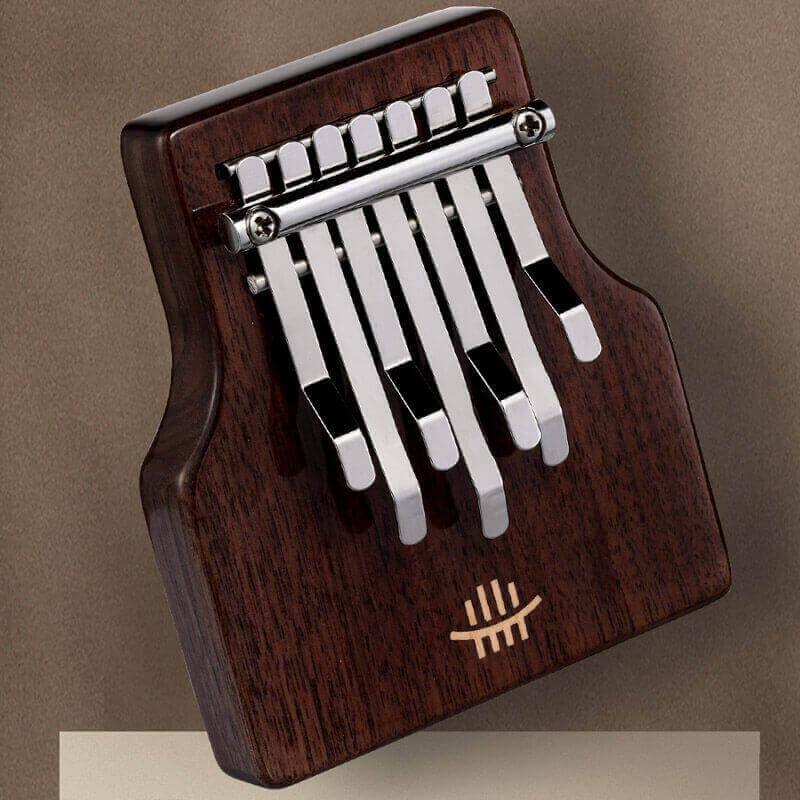 MiSoundofNature Mini 7 Key Chord Hollow Thumb Piano Kalimba, American Black Walnut Box Resonace Portable Finger Piano  C Tone With a Hole at The Bottom - MiSoundofNature